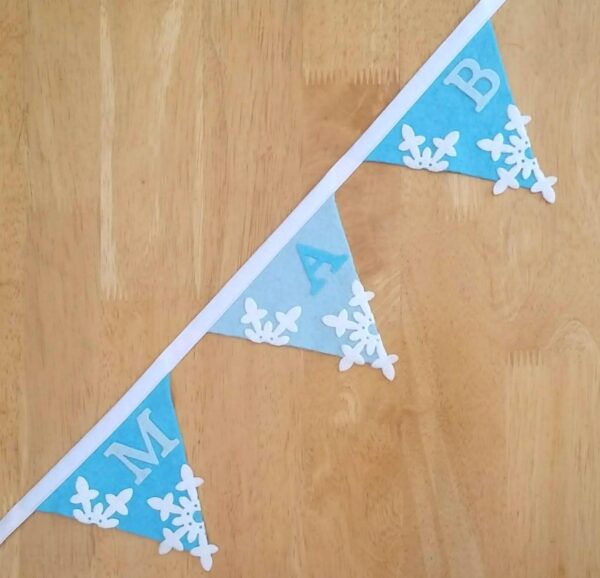 Pale blue and turquoise snowflake bunting
