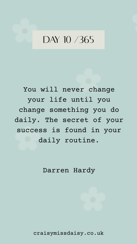 Pale blue-green graphic with a typewriter font Darren Hardy quote about the importance of a daily routine for Day 10/365.