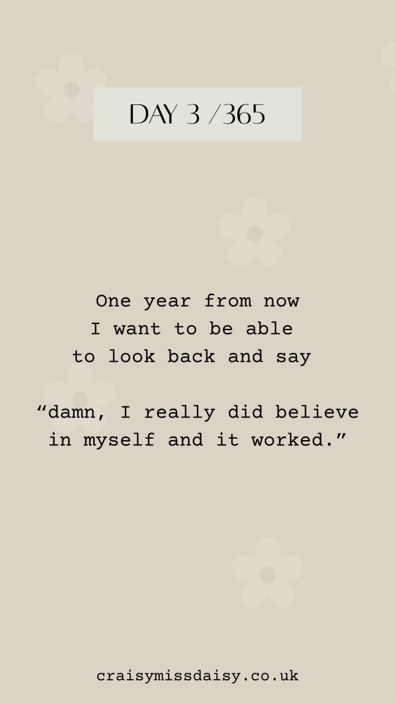 Vertical graphic on warm sandy beige with faint white daisies. A cream box reads DAY 3/365 over an inspirational quote about self-belief.
