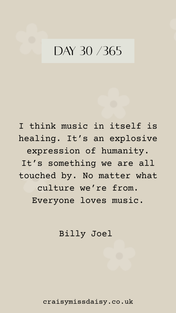 Vertical pastel purple graphic featuring an inspiring quote about the healing power of music by Billy Joel for Day 30/365.